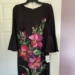 Never worn Gabby Skye Sheath Dress with silver exposed zipper.